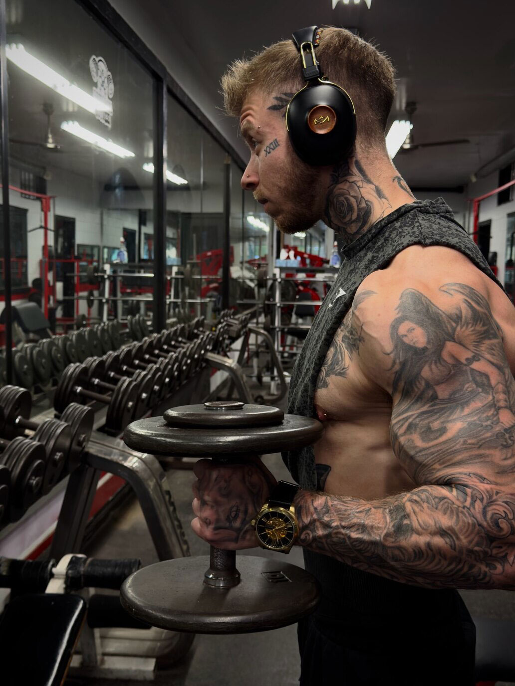 Coach is sitting in a car, smiling